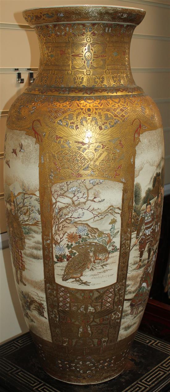 A pair of massive Japanese Satsuma pottery ovoid vases, late 19th century, total height on stands 150cm